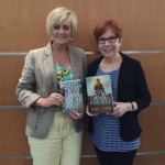 Brenda and Jayne Ann Krentz holding similar titled books